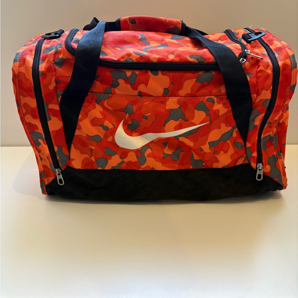 Nike Orange and Black Camo Duffel Bag